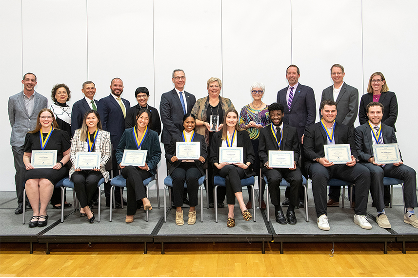 2022 International Business Awards Honorees Pose On Stage for a Group Photo with their Awards