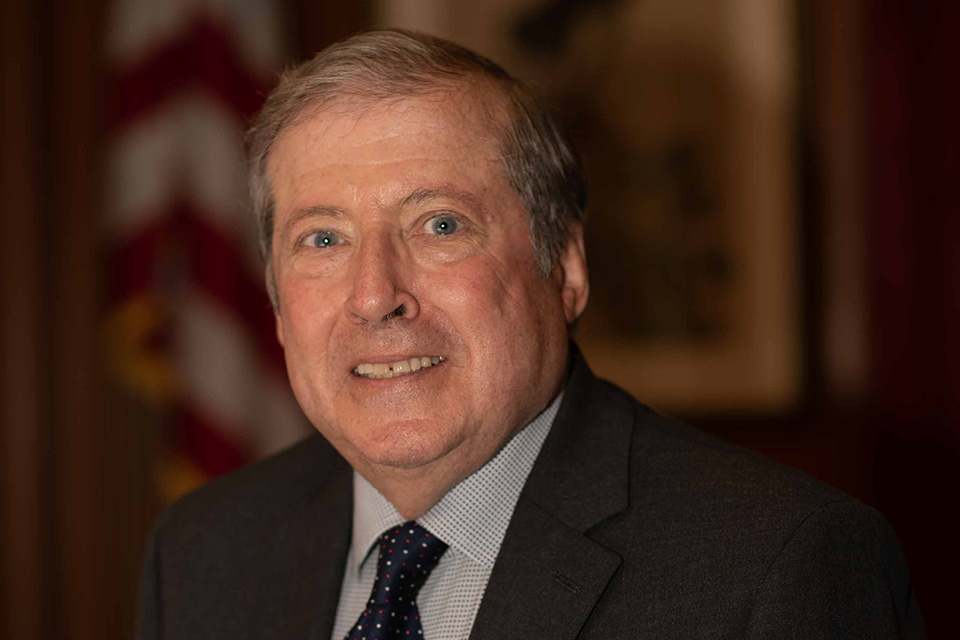 A headshot photo of joe cattaneo