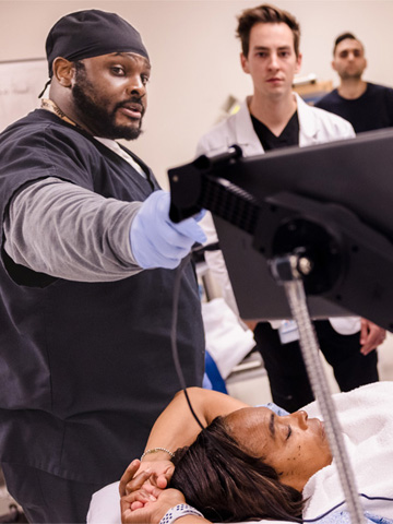 Students meeting in the clinical simulation lab