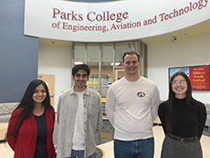 Afrida Atiar, Akbar Fidahussain, Davis Johnston and Elizabeth Redle posed in McDonnell Douglas Hall